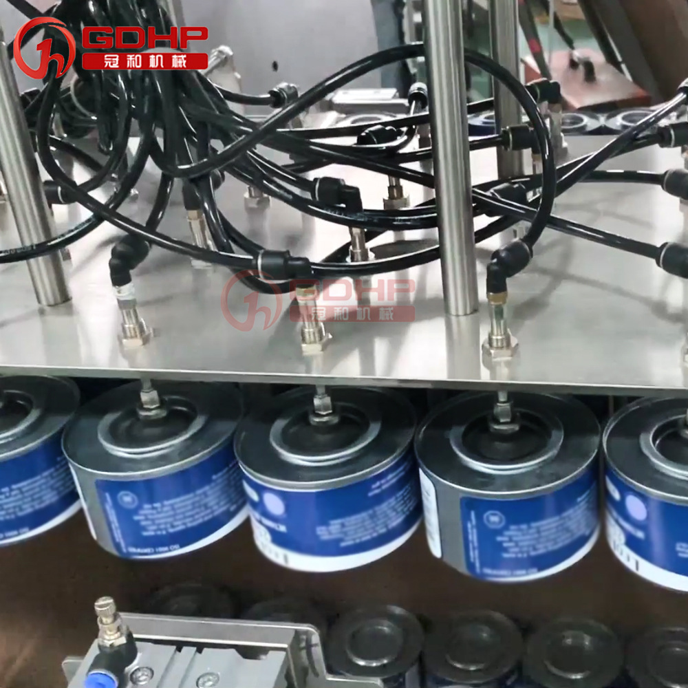 高速馬口鐵罐灌裝壓塞貼標(biāo)裝箱機(jī)生產(chǎn)線-7